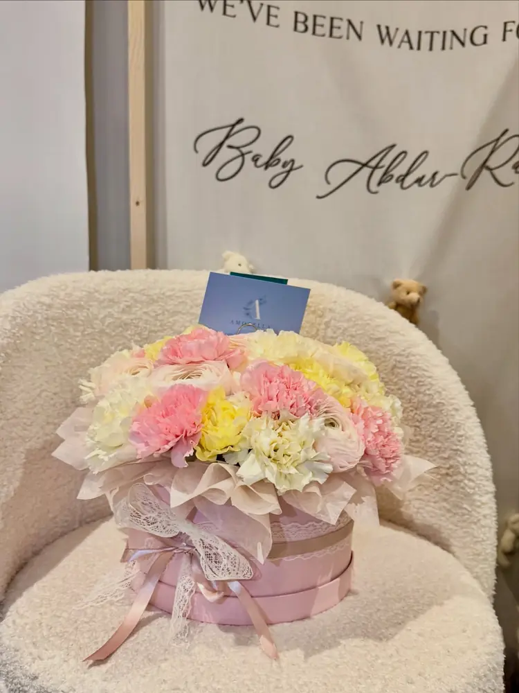 Pink flower hatbox for a new baby girl