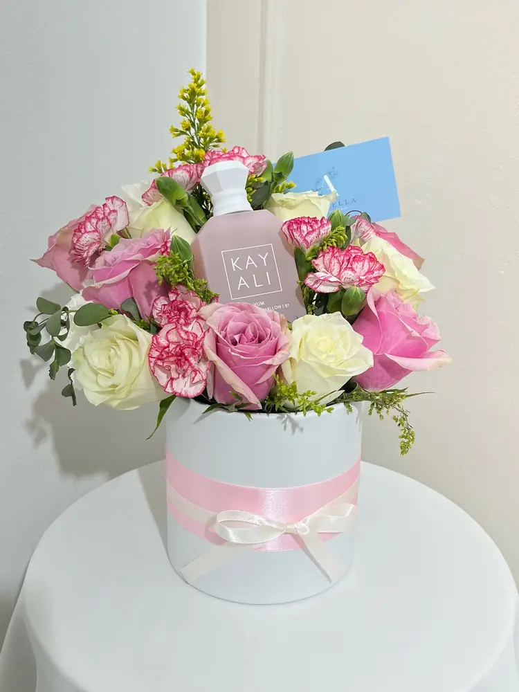 Pink rose hatbox with a perfume gift
