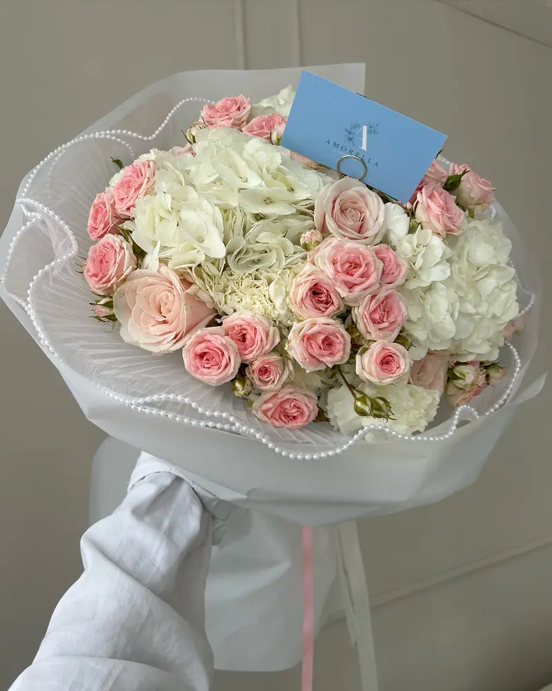 Pink rose and white hydrangea bouquet with pearl trim