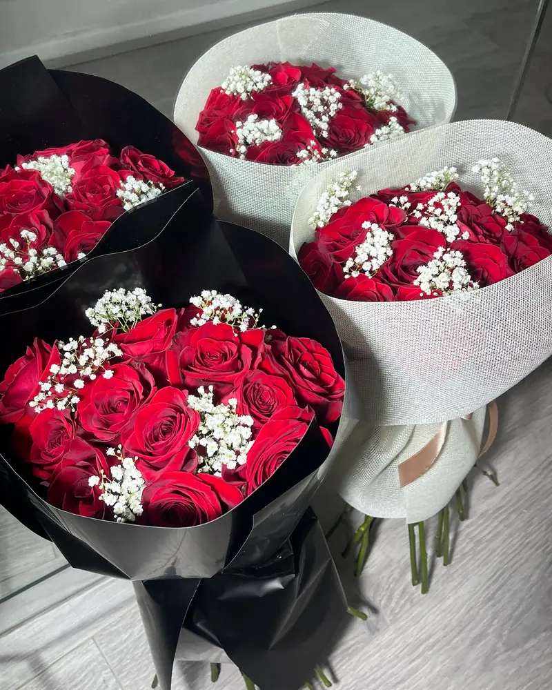 Red rose bouquets in black and white wrap