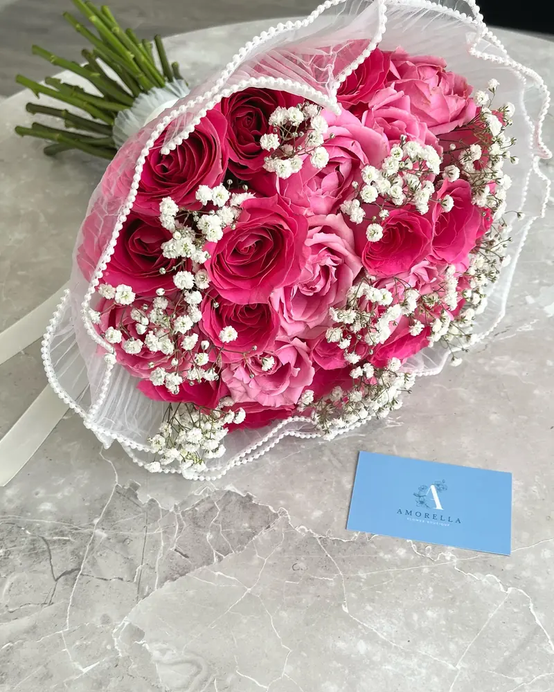 Hot pink rose and gypsophila bouquet with pearl trim
