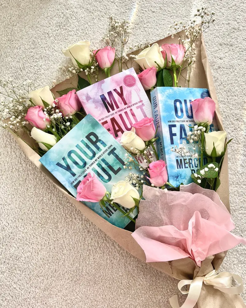 Book lover's bouquet with tulips and novels