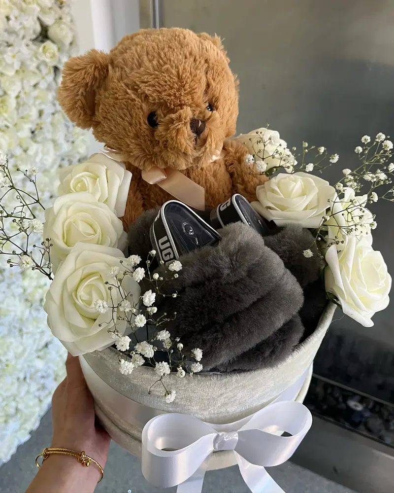 Hatbox hamper with a teddy, slippers and white roses