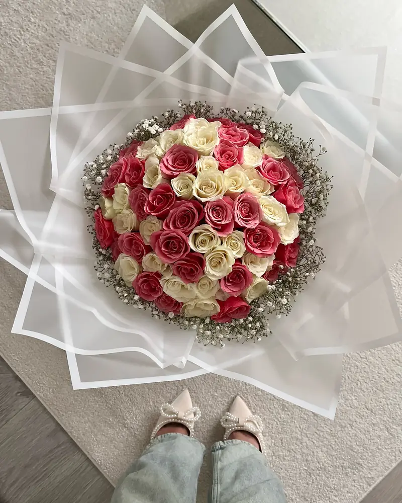 Red and white rose bouquet with gypsophila