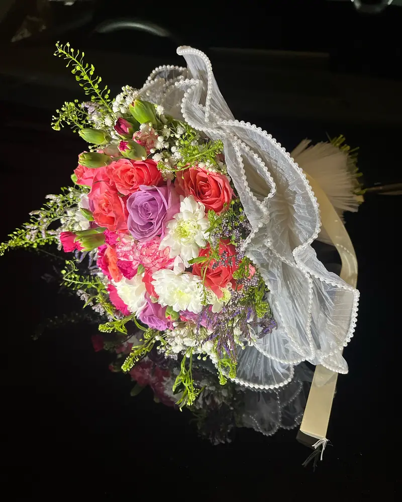 Mixed birthday bouquet with pearl ribbon