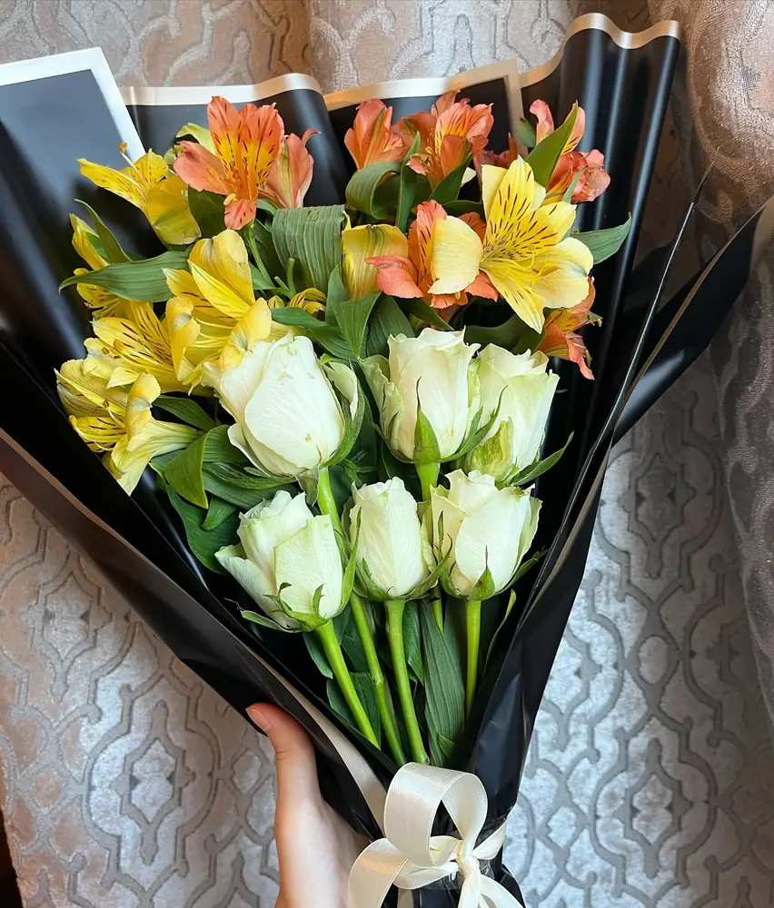 Orange alstroemeria and white rose bouquet